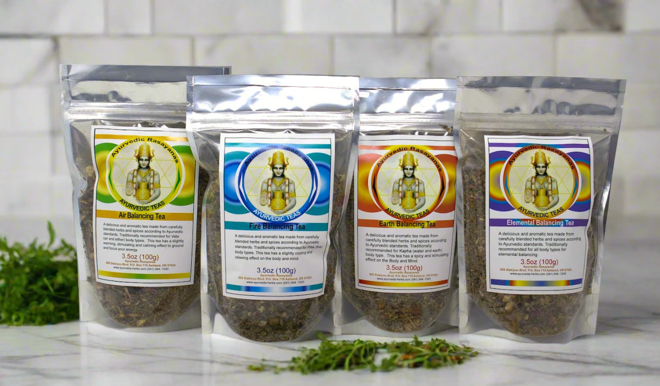 our ayuvedic tea collections on a white marble counter