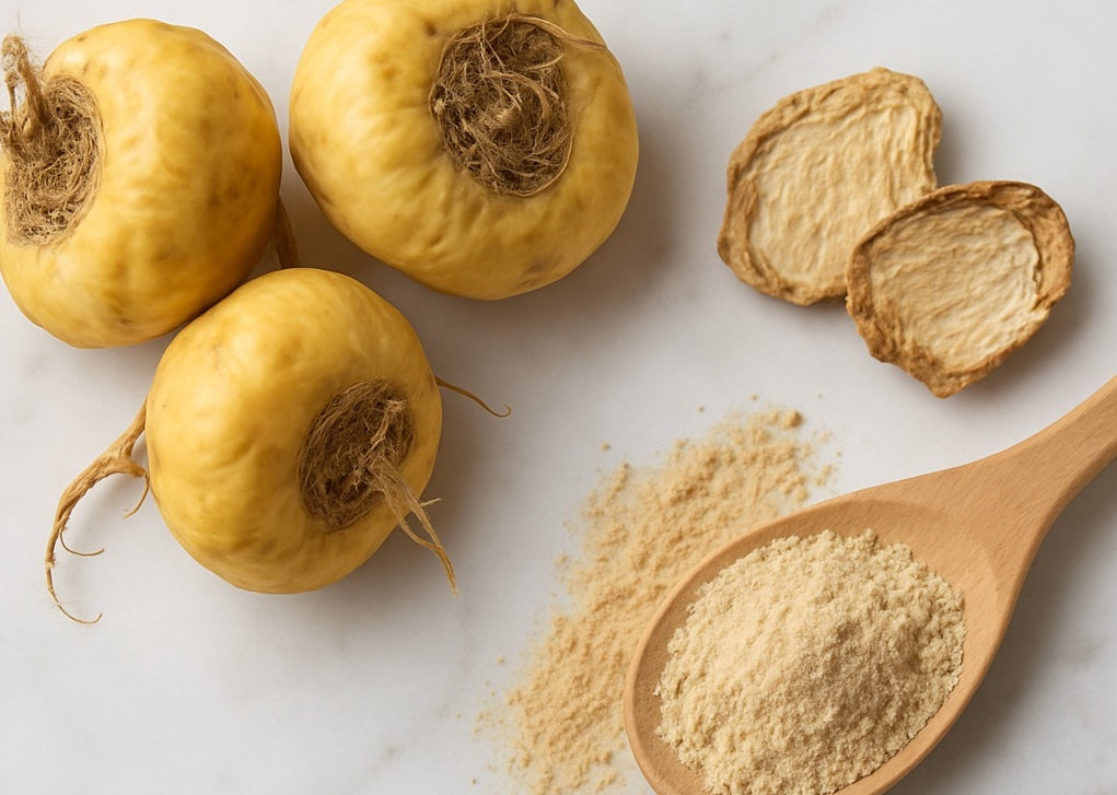 Maca root and powder on white marble
